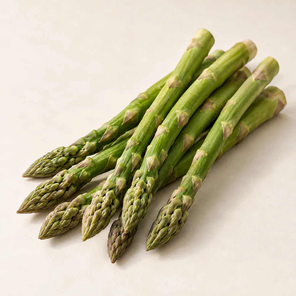 Illustrative studio composition of green asparagus